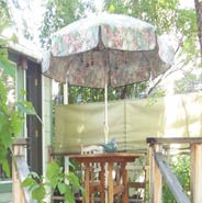 Private deck surrounded by gardens